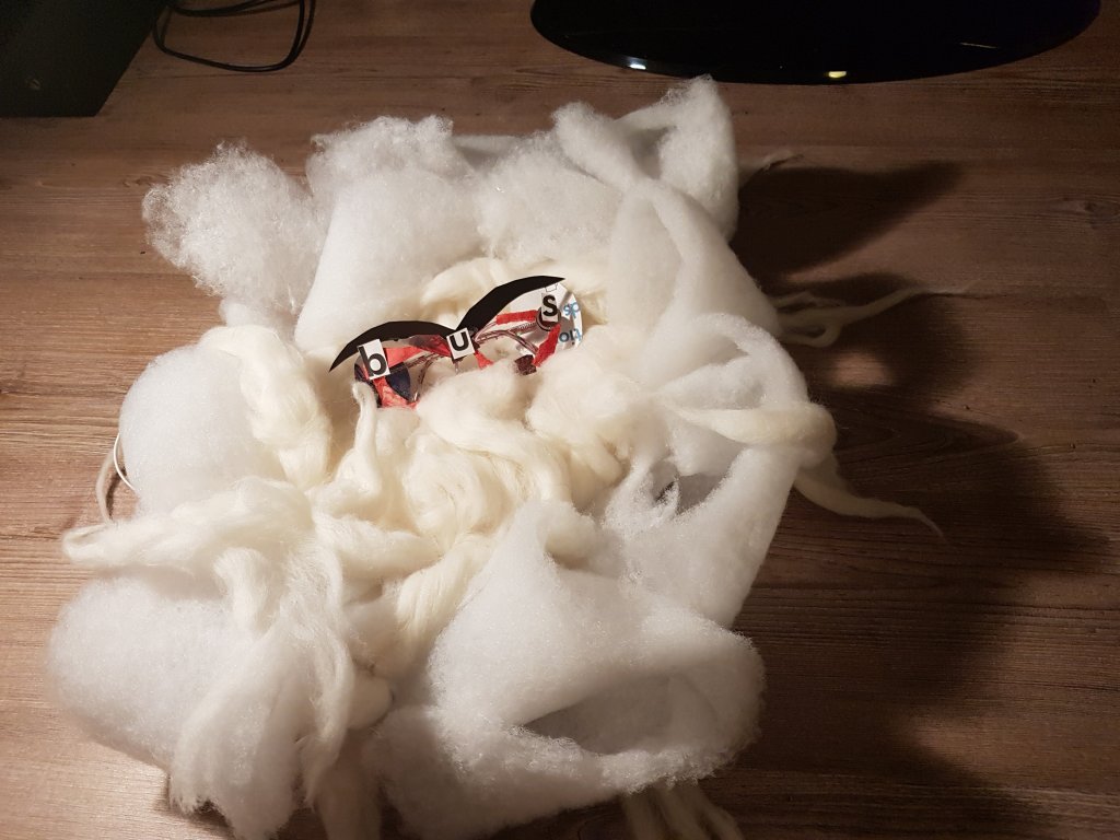 The wig has sculptural face like qualities of it's own.I have ideas of the wig taking on it's own personality and coming alive at night or talking to her (This is also a future scene i'm planning to film)Aswell as a tiny bus driving around her head and going into her mouth.I want the character to be as absurd and surreal as possible like a Monty Python sketch.